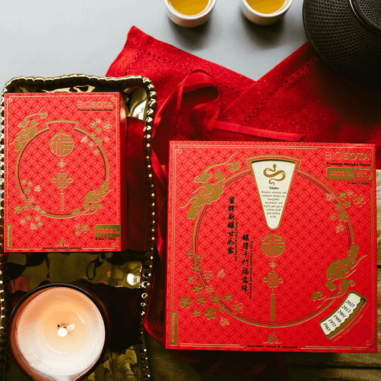 Premium Biosota Organics Manuka Honey MGO 2200+ 250g and 500g Lunar New Year luxury gift Boxes on table