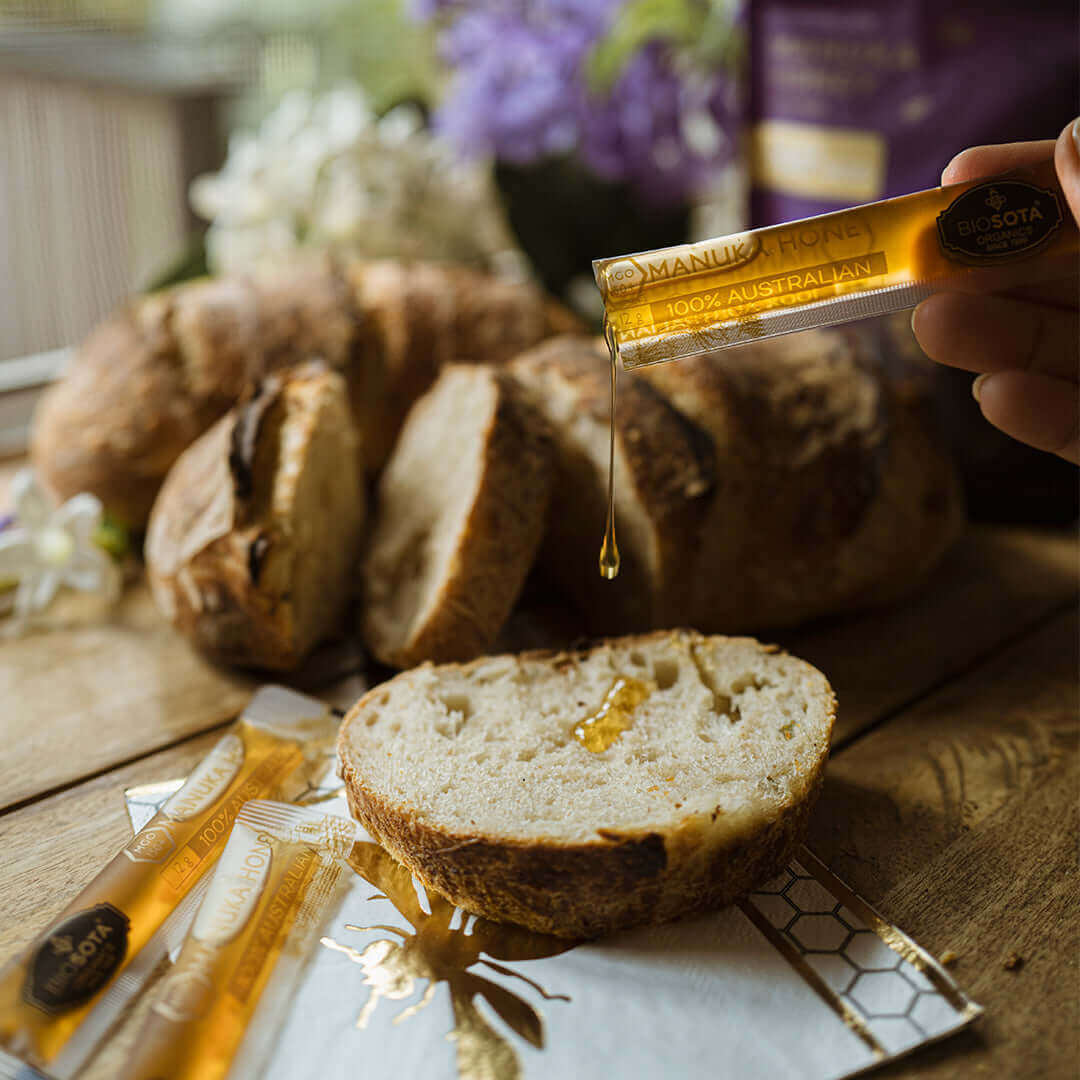 Australian Manuka Honey stick being enjoyed on fresh bread